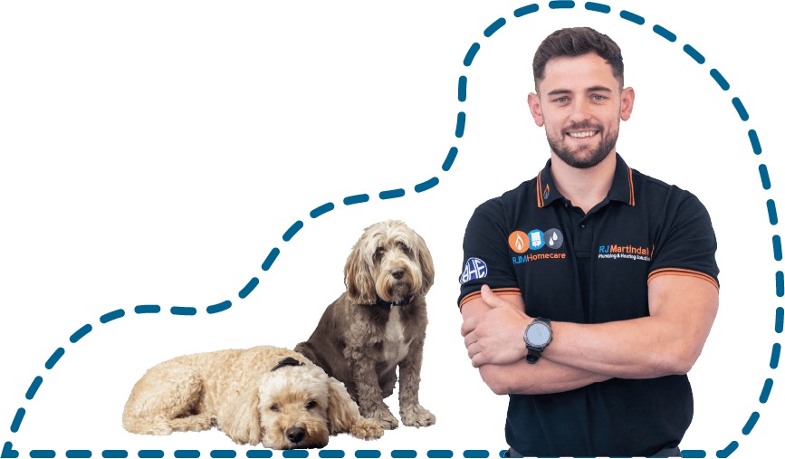 Ryan, owner of RJ Martindale, with his cockapoos Ronnie and Ralph