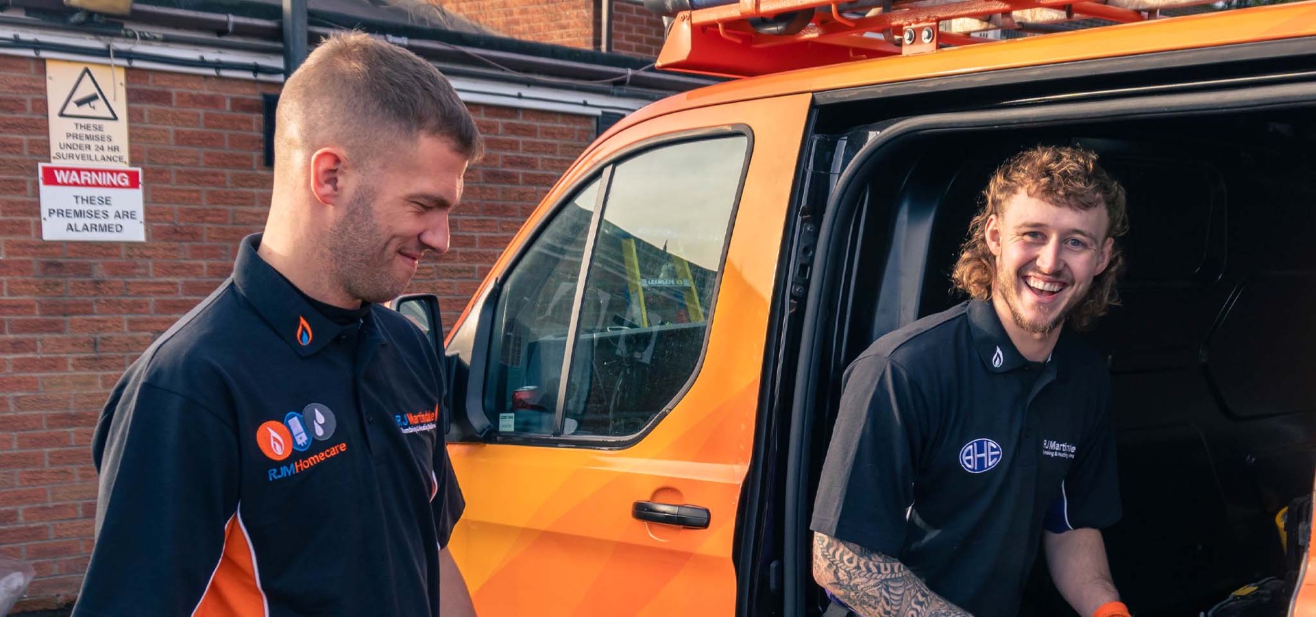 Gas engineers Theo and Scott with an RJ Martindale van